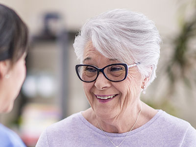 Senior lady with hearing loss